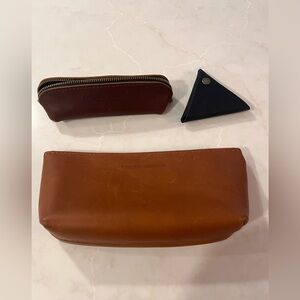 Lot of three Portland leather goods minis pouches and triangle coin purse
